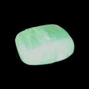Green Aragonite tumbled stone 30mm 25-27g in sunlight - Rocks and Things Store