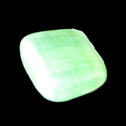 Green Aragonite tumbled stone 30mm 25-27g in sunlight - Rocks and Things Store