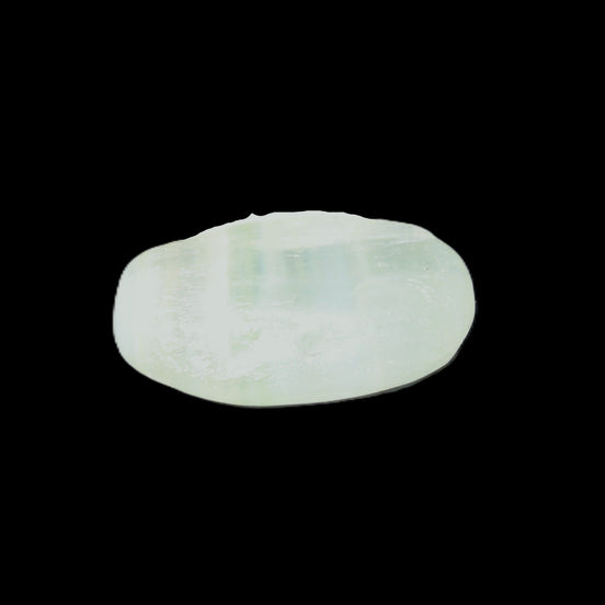 Pistachio Calcite tumbled stone 20-31mm 12-18g in sunlight - Rocks and Things Store
