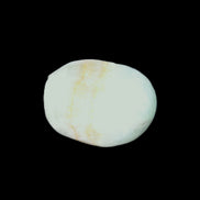 Pistachio Calcite tumbled stone 20-31mm 12-18g in sunlight - Rocks and Things Store