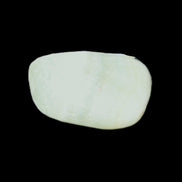 Pistachio Calcite tumbled stone 20-31mm 12-18g in sunlight - Rocks and Things Store