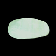 Pistachio Calcite tumbled stone 20-31mm 12-18g in sunlight - Rocks and Things Store