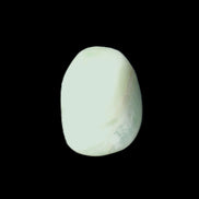 Pistachio Calcite tumbled stone 20-31mm 12-18g in sunlight - Rocks and Things Store