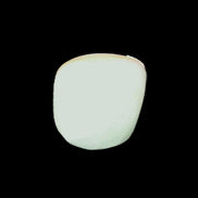 Pistachio Calcite tumbled stone 20-31mm 12-18g in sunlight - Rocks and Things Store