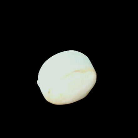 Pistachio Calcite tumbled stone 20-31mm 12-18g in sunlight - Rocks and Things Store