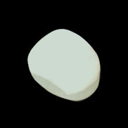 Pistachio Calcite tumbled stone 20-31mm 12-18g in sunlight - Rocks and Things Store