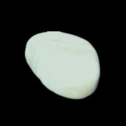 Pistachio Calcite tumbled stone 20-31mm 12-18g in sunlight - Rocks and Things Store