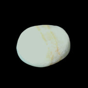 Pistachio Calcite tumbled stone 20-31mm 12-18g in sunlight - Rocks and Things Store