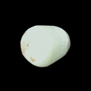 Pistachio Calcite tumbled stone 20-31mm 12-18g in sunlight - Rocks and Things Store