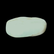 Pistachio Calcite tumbled stone 20-31mm 12-18g in sunlight - Rocks and Things Store