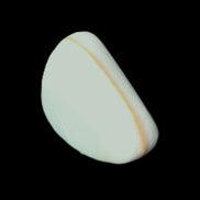 Pistachio Calcite tumbled stone 20-31mm 12-18g in sunlight - Rocks and Things Store