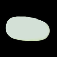 Pistachio Calcite tumbled stone 20-31mm 12-18g in sunlight - Rocks and Things Store