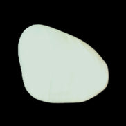 Pistachio Calcite tumbled stone 20-31mm 12-18g in sunlight - Rocks and Things Store