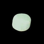 Pistachio Calcite tumbled stone 23-33mm 14-20g in sunlight - Rocks and Things Store