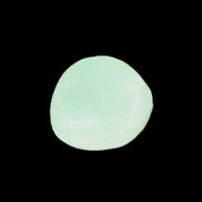 Pistachio Calcite tumbled stone 23-33mm 14-20g in sunlight - Rocks and Things Store