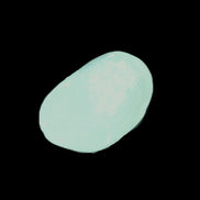 Pistachio Calcite tumbled stone 23-33mm 14-20g in sunlight - Rocks and Things Store