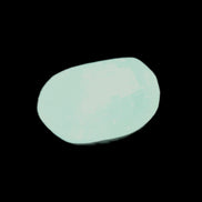 Pistachio Calcite tumbled stone 23-33mm 14-20g in sunlight - Rocks and Things Store