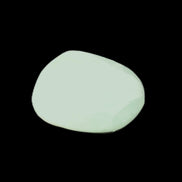 Pistachio Calcite tumbled stone 23-33mm 14-20g in sunlight - Rocks and Things Store