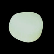 Pistachio Calcite tumbled stone 23-33mm 14-20g in sunlight - Rocks and Things Store