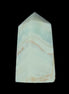 Pistachio Calcite obelisk 56*26*23mm 73g in sunlight - Rocks and Things Store