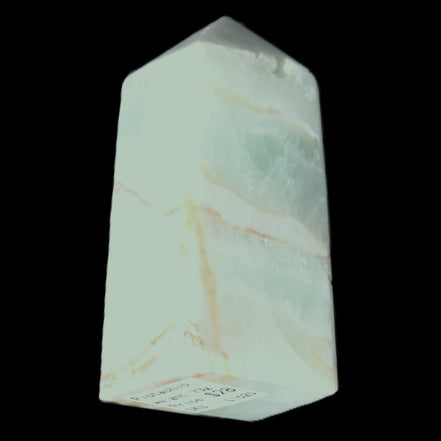 Pistachio Calcite obelisk 56*26*23mm 73g in sunlight - Rocks and Things Store