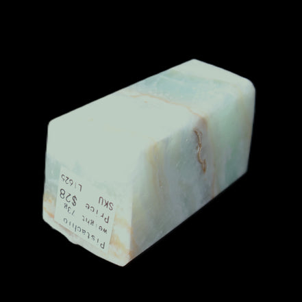 Pistachio Calcite obelisk 56*26*23mm 73g in sunlight - Rocks and Things Store