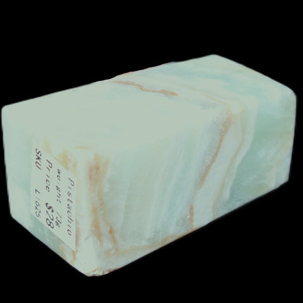 Pistachio Calcite obelisk 56*26*23mm 73g in sunlight - Rocks and Things Store