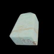 Pistachio Calcite obelisk 51*35*24mm 77g in sunlight - Rocks and Things Store
