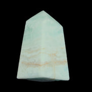 Pistachio Calcite obelisk 51*35*24mm 77g in sunlight - Rocks and Things Store