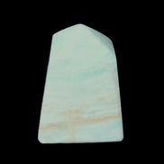 Pistachio Calcite obelisk 51*35*24mm 77g in sunlight - Rocks and Things Store