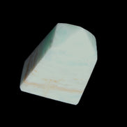 Pistachio Calcite obelisk 51*35*24mm 77g in sunlight - Rocks and Things Store