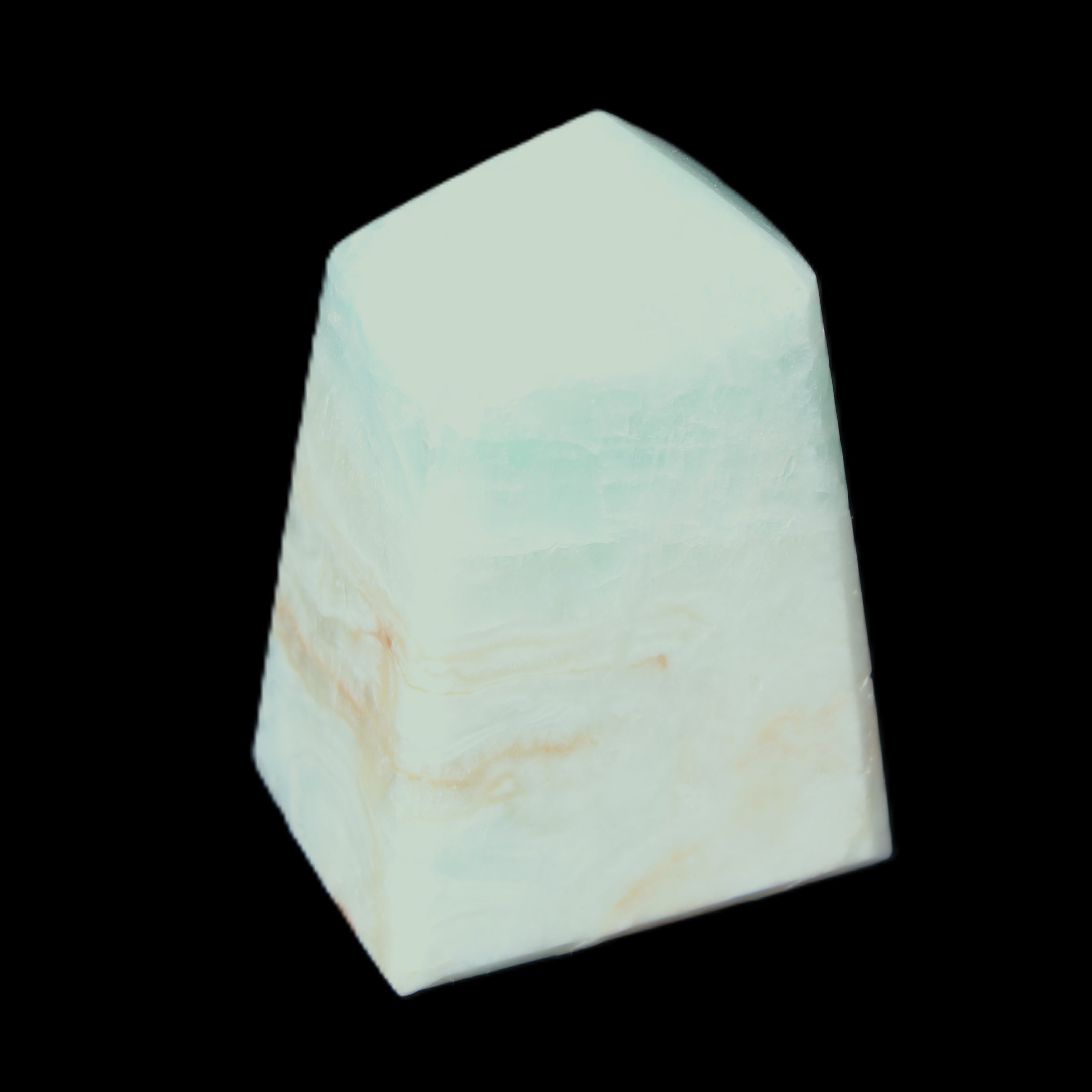 Pistachio Calcite obelisk 51*35*24mm 77g in sunlight - Rocks and Things Store