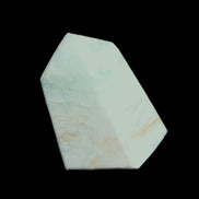 Pistachio Calcite obelisk 51*35*24mm 77g in sunlight - Rocks and Things Store