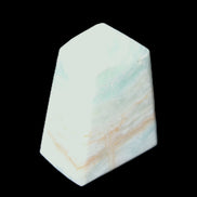 Pistachio Calcite obelisk 51*35*24mm 77g in sunlight - Rocks and Things Store