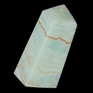 Pistachio Calcite obelisk 75*35*28mm 142g in sunlight - Rocks and Things Store