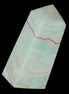 Pistachio Calcite obelisk 75*35*28mm 142g in sunlight - Rocks and Things Store