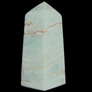 Pistachio Calcite obelisk 75*35*28mm 142g in sunlight - Rocks and Things Store