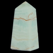 Pistachio Calcite obelisk 75*35*28mm 142g in sunlight - Rocks and Things Store