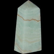 Pistachio Calcite obelisk 75*35*28mm 142g in sunlight - Rocks and Things Store