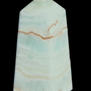 Pistachio Calcite obelisk 75*35*28mm 142g in sunlight - Rocks and Things Store