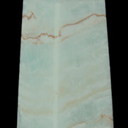 Pistachio Calcite obelisk 75*35*28mm 142g in sunlight - Rocks and Things Store