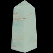 Pistachio Calcite obelisk 75*35*28mm 142g in sunlight - Rocks and Things Store