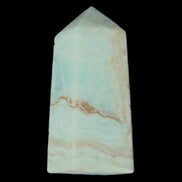 Pistachio Calcite obelisk 68*28*24mm 92g in sunlight - Rocks and Things Store