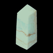 Pistachio Calcite obelisk 68*28*24mm 92g in sunlight - Rocks and Things Store