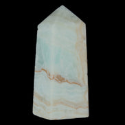 Pistachio Calcite obelisk 68*28*24mm 92g in sunlight - Rocks and Things Store