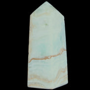 Pistachio Calcite obelisk 68*28*24mm 92g in sunlight - Rocks and Things Store