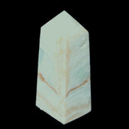Pistachio Calcite obelisk 68*28*24mm 92g in sunlight - Rocks and Things Store