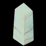 Pistachio Calcite obelisk 68*28*24mm 92g in sunlight - Rocks and Things Store