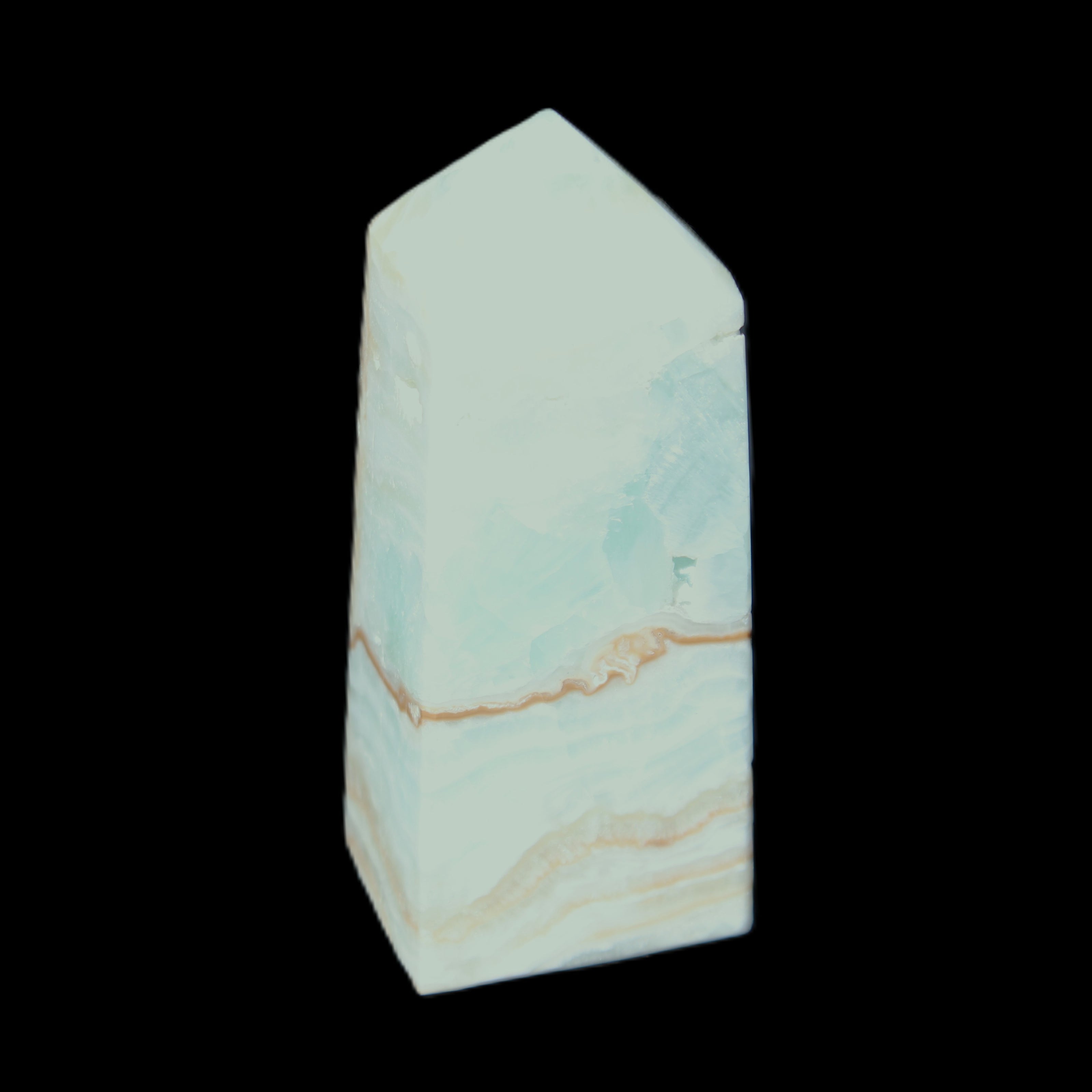 Pistachio Calcite obelisk 68*28*24mm 92g in sunlight - Rocks and Things Store