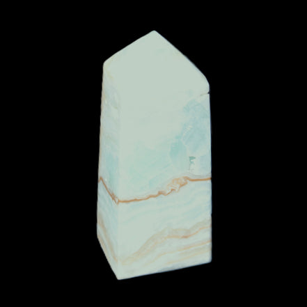Pistachio Calcite obelisk 68*28*24mm 92g in sunlight - Rocks and Things Store